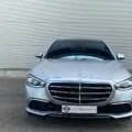 Front view of a luxurious silver Mercedes-Benz S450 available for rent at Car4Rent, showcasing the iconic grille and sleek design.